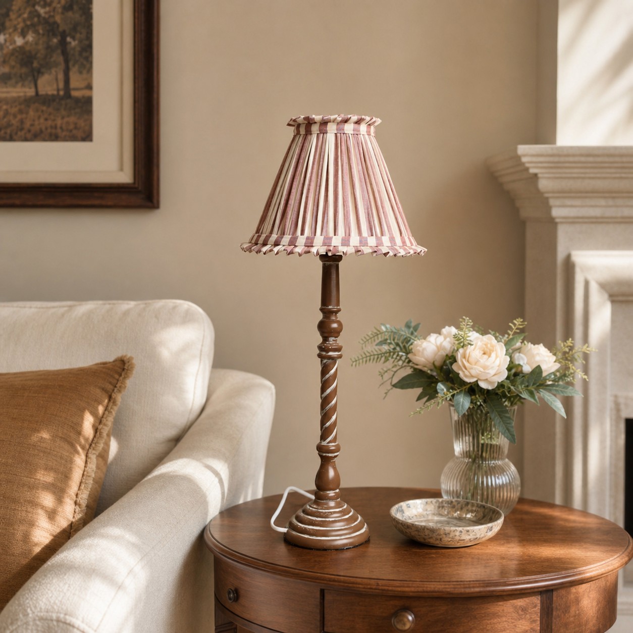 Pink striped French country table lamp in living room side table setting