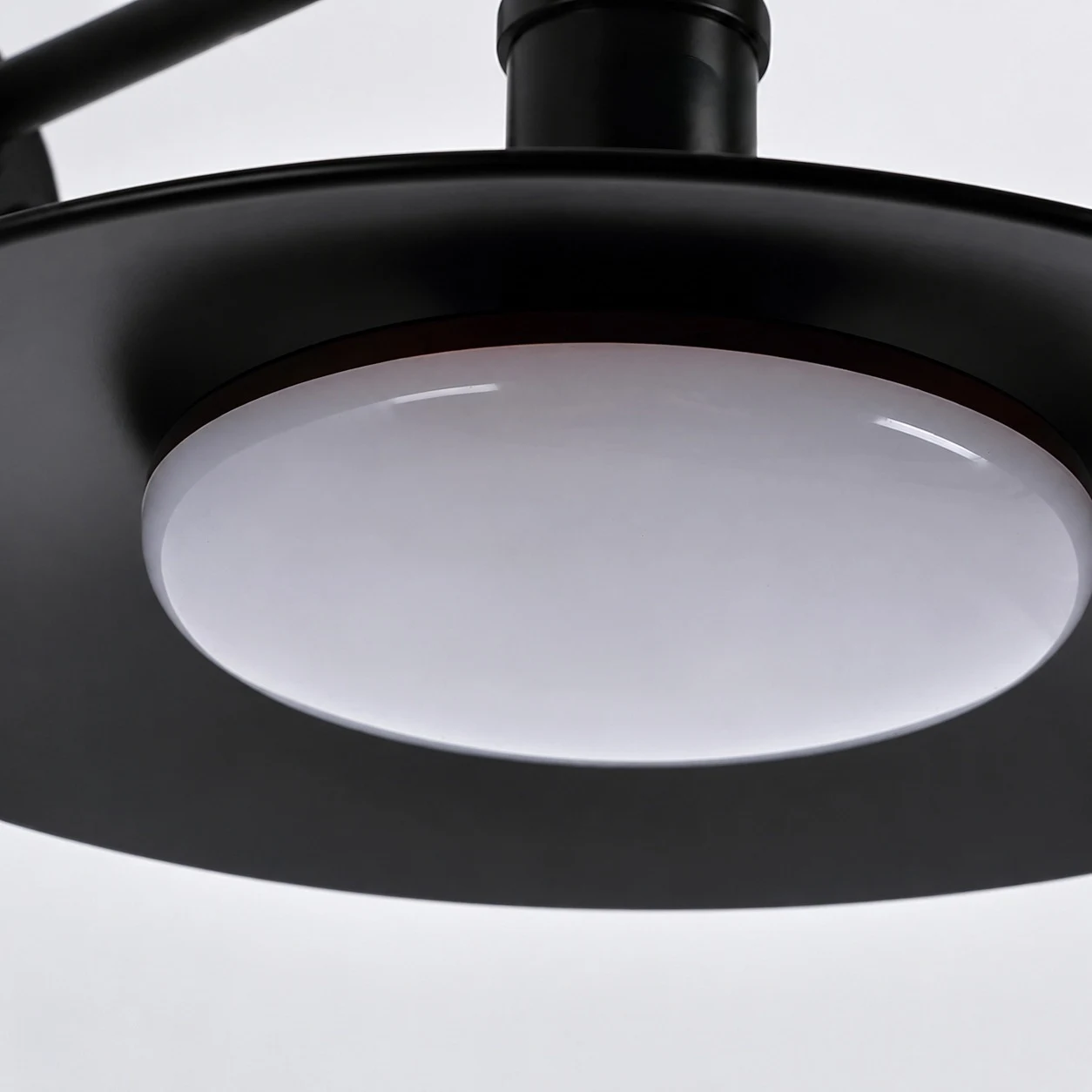 Close view of the black metal shade and diffuser